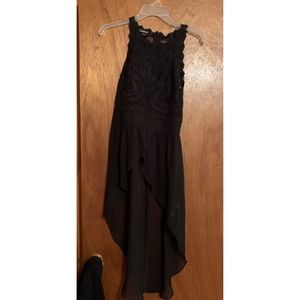 Bebe high low tank top.